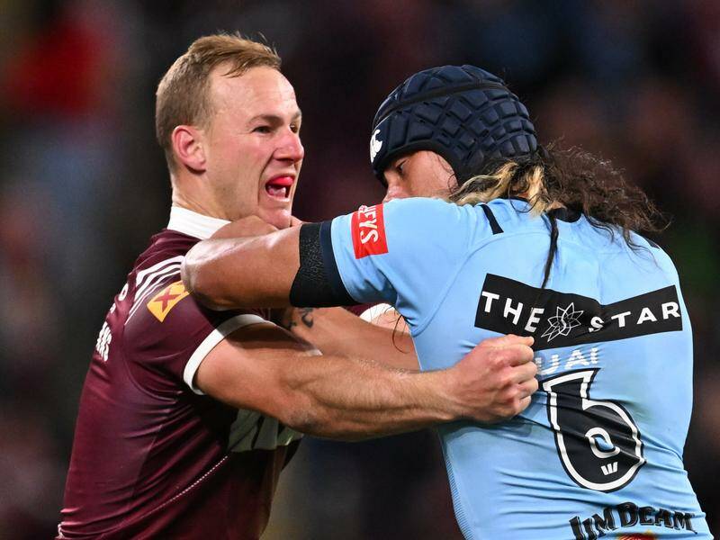 A scuffle between Daly Cherry-Evans of the Maroons and Blues' Jarome Luai escalated into a brawl. Photo: Dave Hunt/AAP PHOTOS