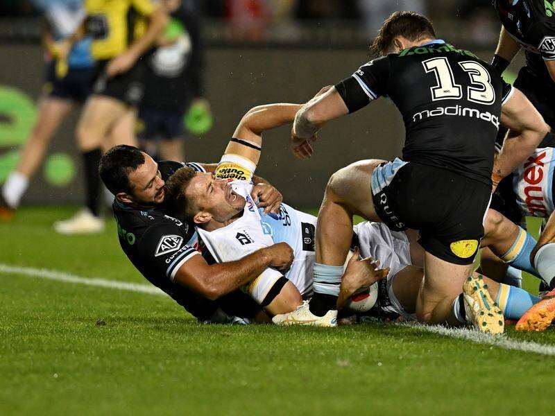 Kieran Foran opened the scoring for the Titans in their 20-16 win over the Sharks in Coffs Harbour. (Grant Trouville/AAP PHOTOS)