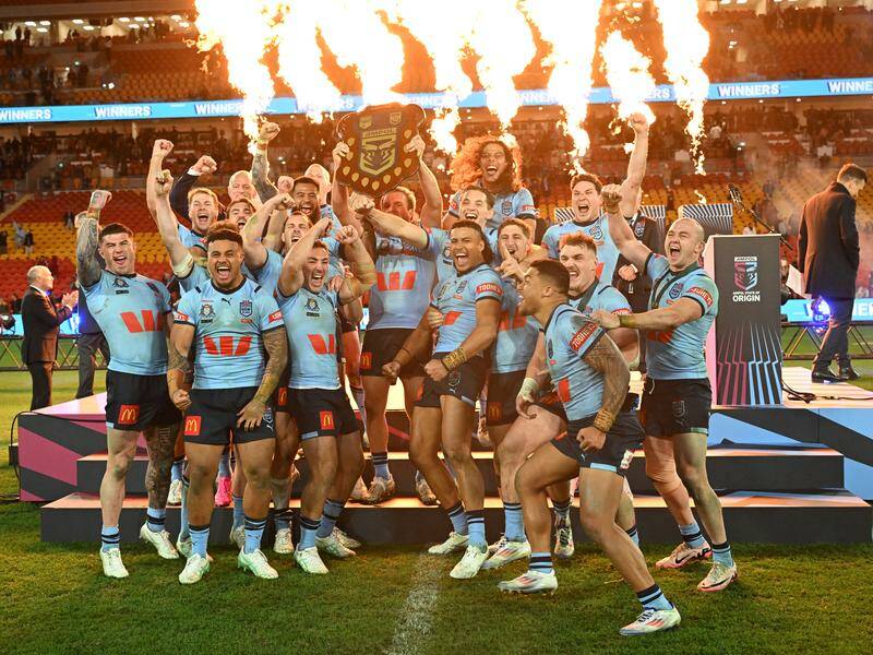 NSW celebrate their Origin series-deciding 14-4 win over Queensland at Suncorp Stadium. Photo: Darren England/AAP PHOTOS