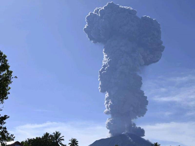 Indonesia's Mount Ibu volcano has erupted again, spewing ash 5km into the sky. (AP PHOTO)