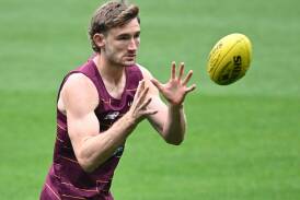 Brisbane have been fined $40,000 over their handling of concussion steps concerning Harris Andrews. Photo: Joel Carrett/AAP PHOTOS