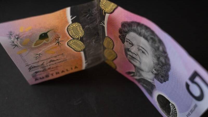 A design honouring First Australians will replace the Queen on the $5 banknote. Picture by Lukas Coch/AAP PHOTOS