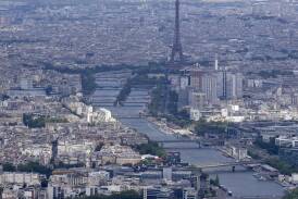 Recent tests showed unsafe bacteria levels in the Seine River as Olympic competition nears. (AP PHOTO)