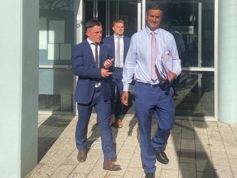 Tom Starling (left) has had an intimidation charge dropped and Josh (centre) has avoided conviction. (Mark Russell/AAP PHOTOS)