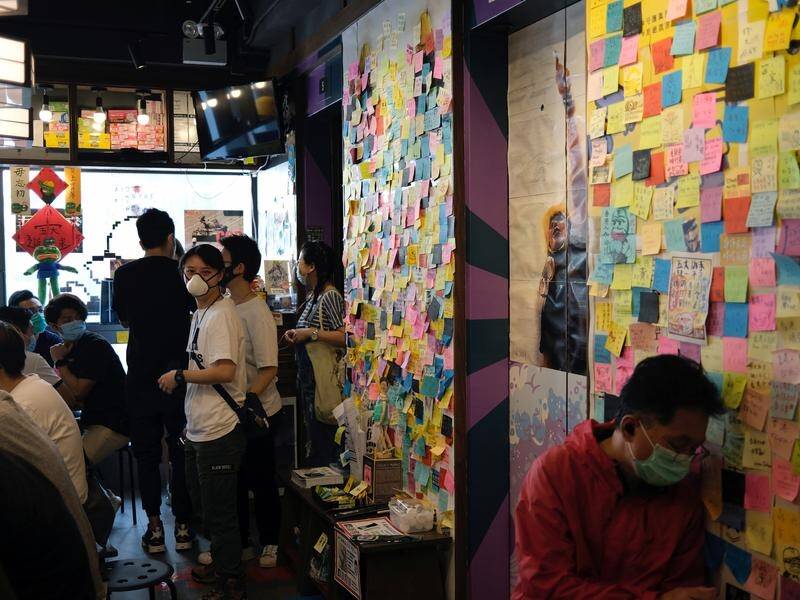 Hong Kong protesters have gathered at businesses that openly support the democracy movement.