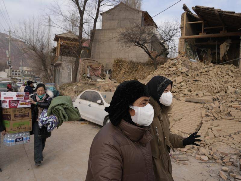More than 207,000 homes have been wrecked in Gansu, affecting more than 145,000 people. (AP PHOTO)