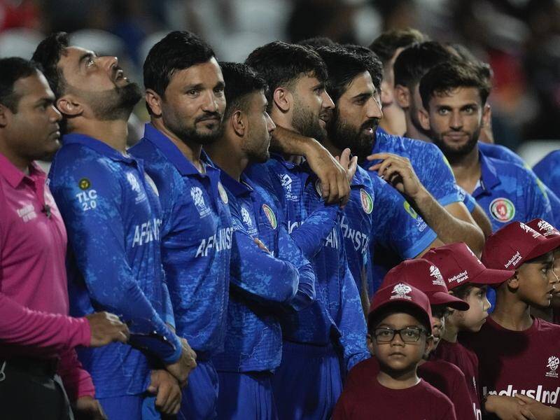 Afghanistan line up before their T20 World Cup semi-final with South Africa. (AP PHOTO)