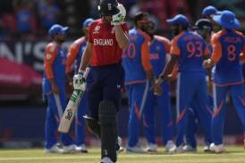 England captain Jos Buttler walks off after losing his wicket in his side's 68-run defeat to India. (AP PHOTO)