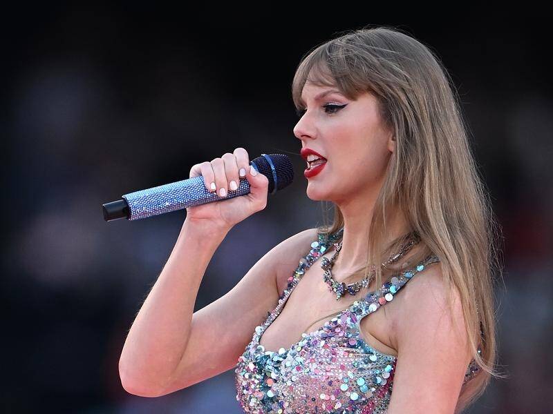 Taylor Swift sings up a storm in rain hit Sydney show | Newcastle Herald |  Newcastle, NSW