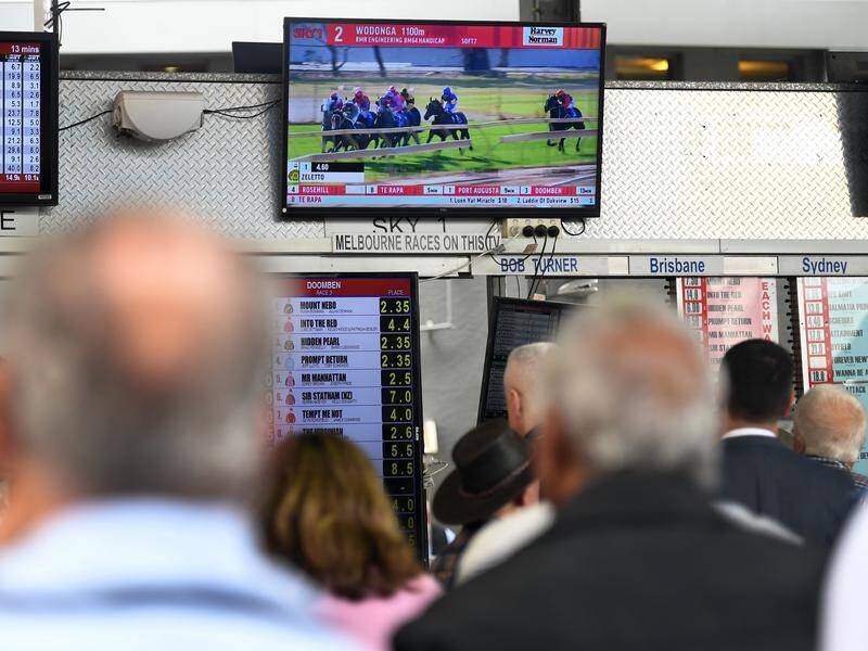 Spending on gambling went up among those who withdrew super during COVID-19, researchers found. (Dan Peled/AAP PHOTOS)