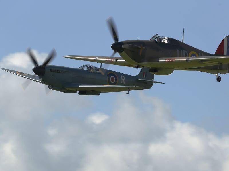 A Spitfire aircraft (l) at an event commemorating the Battle of Britain, together with a Hurricane. (EPA PHOTO)