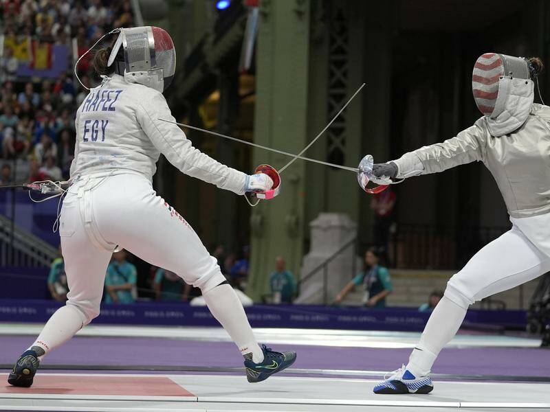 Nada Hafez in fencing action before the Egyptian revealed she was competing seven months pregnant. Photo: AP PHOTO