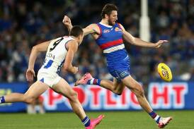 The Bulldogs will be hoping their midfield led by Marcus Bontempelli stands up against Carlton. (Rob Prezioso/AAP PHOTOS)