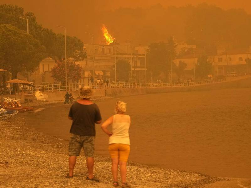 Fires continue to rage across Greece but some north of Athens have been extinguished.