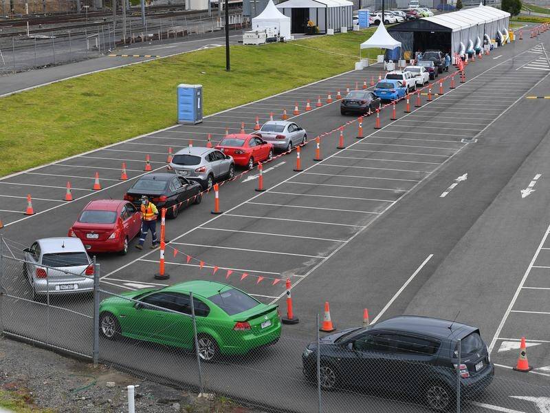 Long queues have formed at testing sites as interstate travellers rush to beat border deadlines.