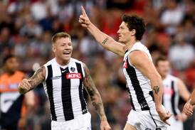 Jordan De Goey (L) and Brody Mihocek are expected to add more clout to Collingwood after the bye. (Steven Markham/AAP PHOTOS)