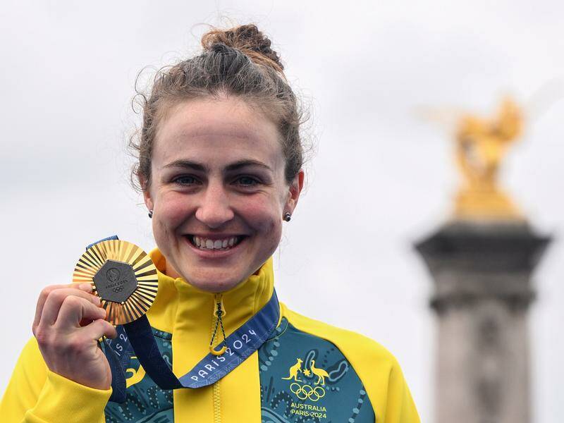 Grace Brown's gold medal is a big confidence boost for the Australian cycling team in Paris. Photo: Joel Carrett/AAP PHOTOS