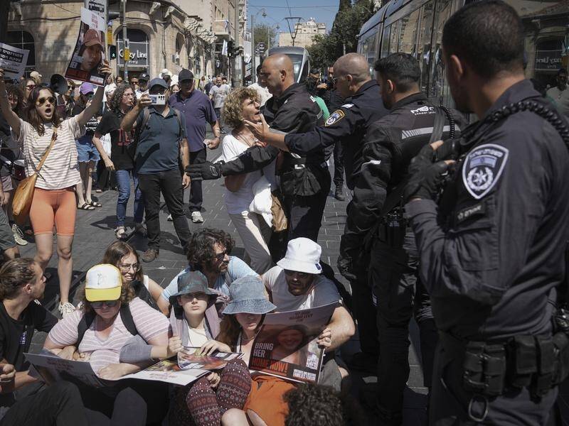 Protesters have blocked roads in Jerusalem as they call for the release of hostages held in Gaza. (AP PHOTO)