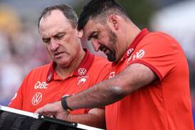 Sydney coach John Longmire (L) is comfortable with Dean Cox (R) being linked to the Eagles' top job. (Michael Errey/AAP PHOTOS)