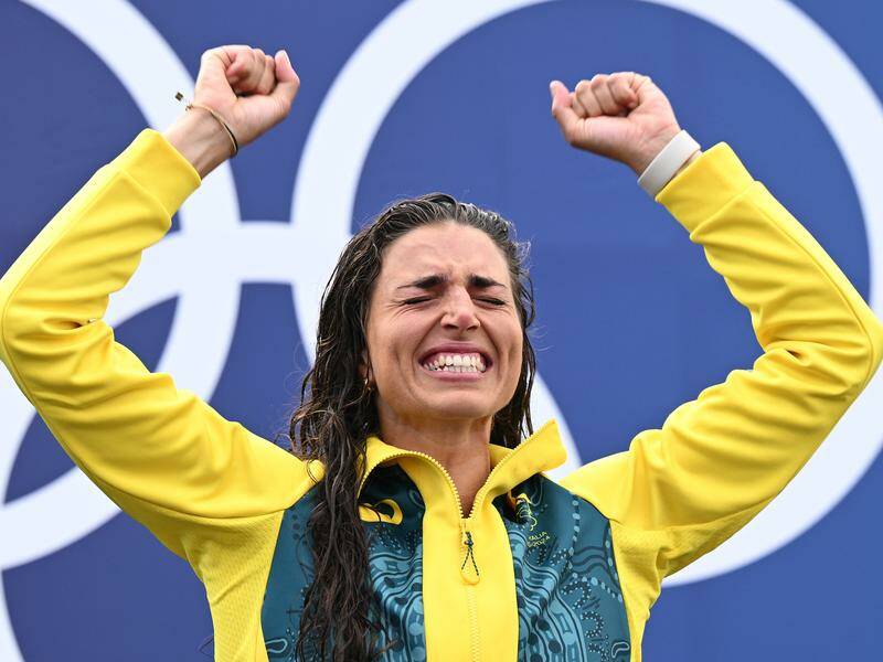 An elated Jessica Fox finally stands on top of the Olympic podium in the K1 event. Photo: Dan Himbrechts/AAP PHOTOS