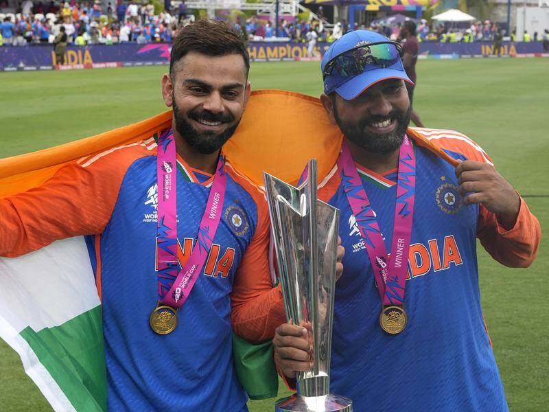 Virat Kohli (L) and Rohit Sharma (R) have more to offer Indian cricket, says their new coach. Photo: AP PHOTO