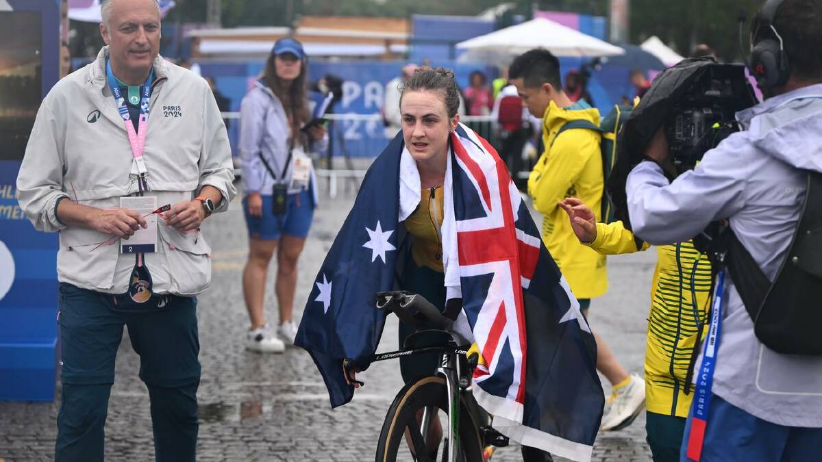 Grace Brown after winning Australia's first gold medal at the Paris Olympics. (Joel Carrett/AAP PHOTOS)