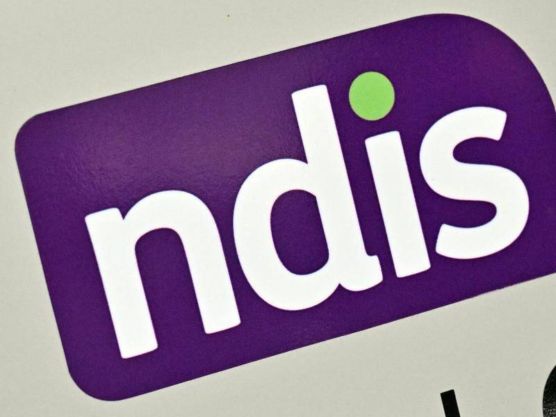 Laws before parliament aim to contain NDIS budget blowouts by limiting spending growth. (Mick Tsikas/AAP PHOTOS)