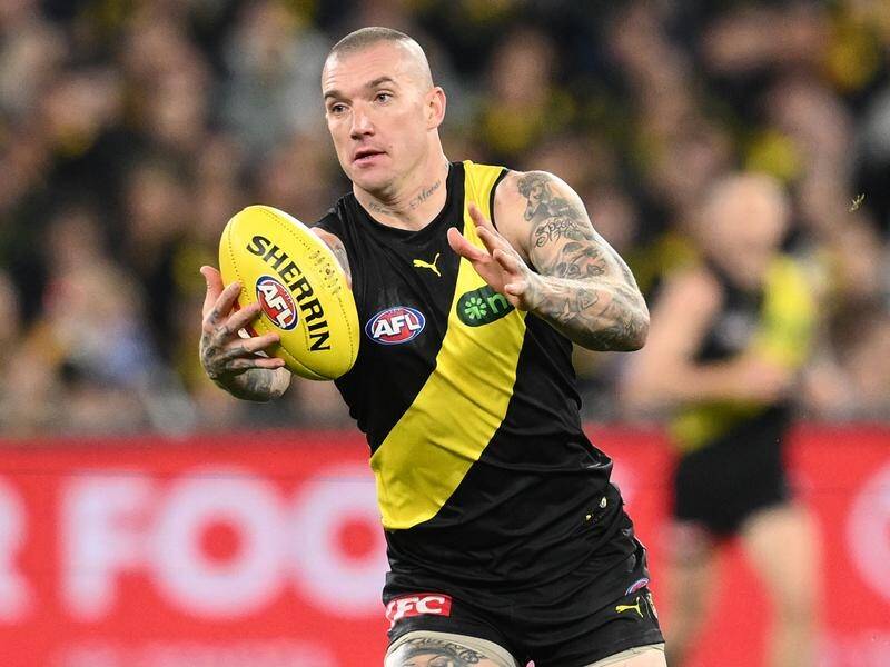 The Suns say they'd be mad not to try and lure Richmond's Dustin Martin up to the Gold Coast. (Joel Carrett/AAP PHOTOS)