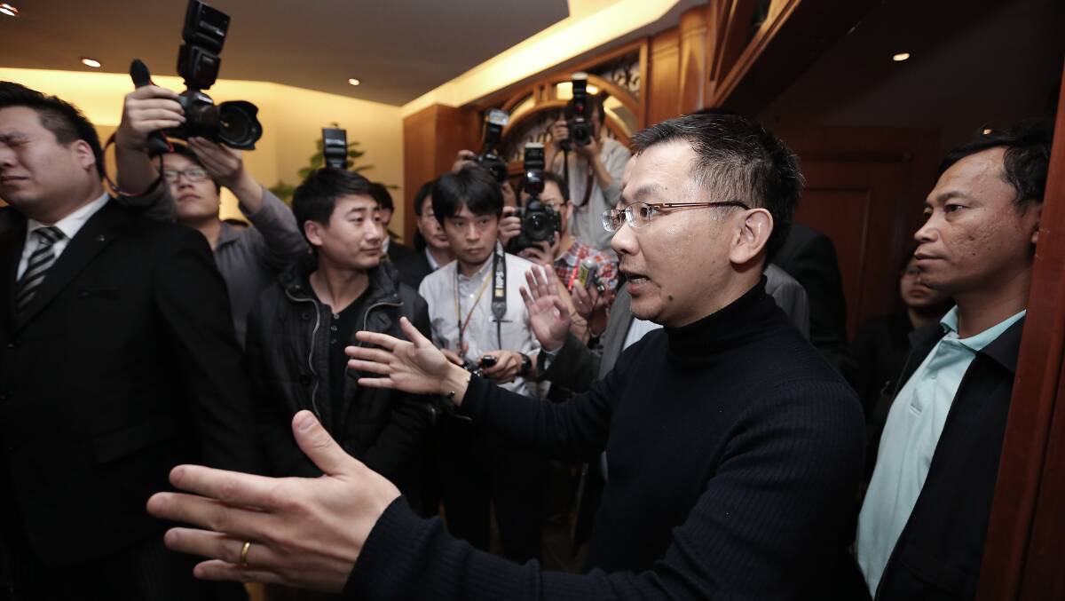 Joshua Law Kok Hwa, Malaysia Airlines' regional senior vice president of China speaks to media at Lido Hotel as the search continues for the missing Malaysian airliner on March 9, 2014 in Beijing, China. Photo: Getty Images
