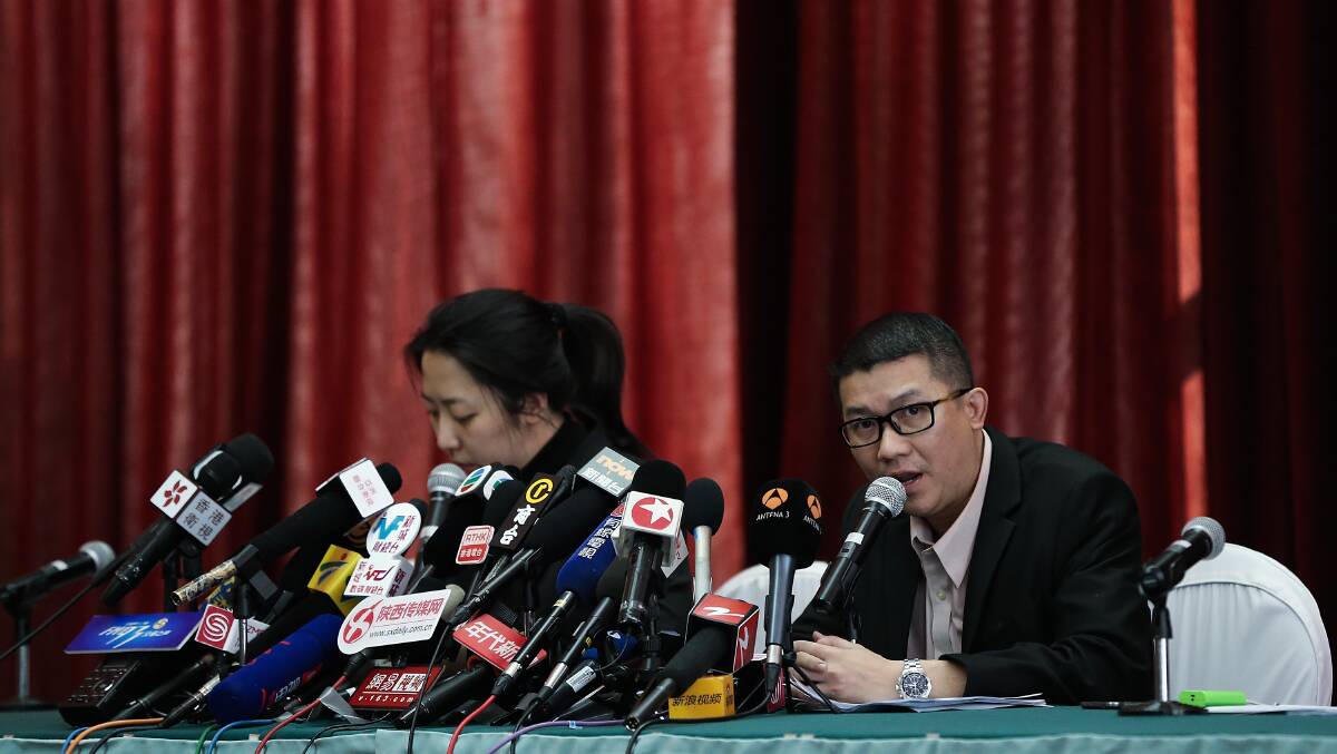 Ignatius Ong (Center) from Malaysia Airline speak during a press conference on March 9, 2014 in Beijing, China. Photo: Getty Images