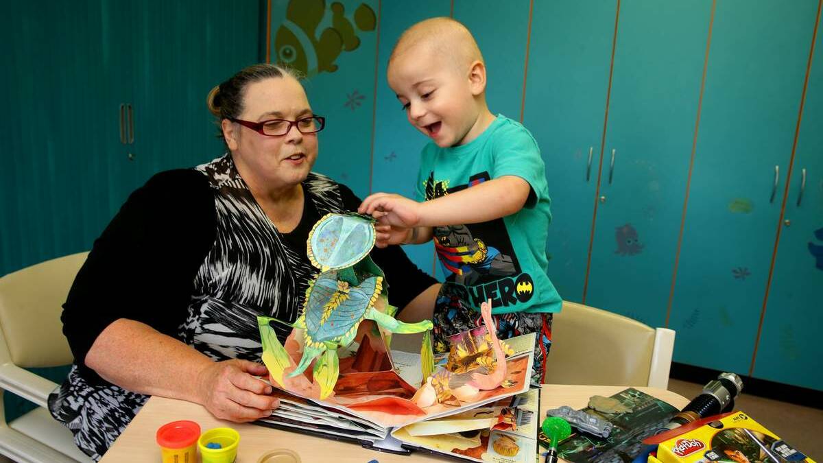 ALLAYING CONCERN: Play therapist Veronica Oakley has helped Kane Ransom, 3,  get over  worries about hospital.  Picture: Jonathan Carroll