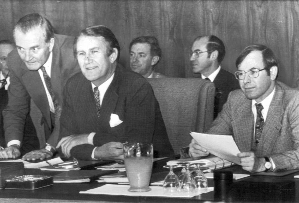 June 22, 1978: Malcolm Fraser (centre), Senator Carrick (left) and Treasurer John Howard at the premiers conference in Canberra.