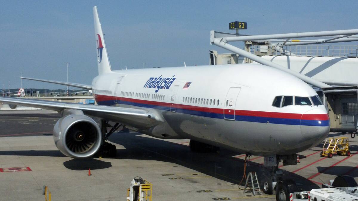 Malaysian Airlines flight shot down over Ukraine with 27 Australians on board