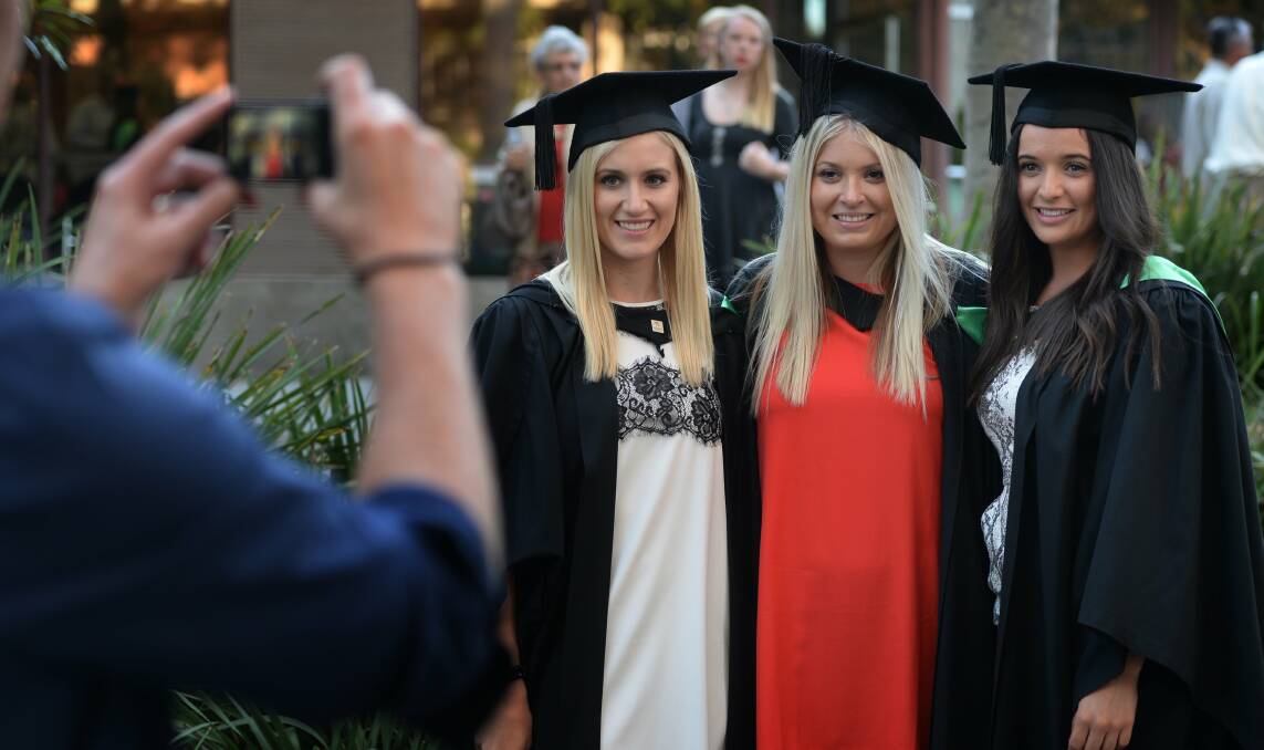 University of Newcastle Graduation. Faculty of Education and Arts. Graduates, Brittany Callaghan of Merewether, Aleisha Montgomery of Belmont and Laura Cronin of Sydney. pic  Marina Neil