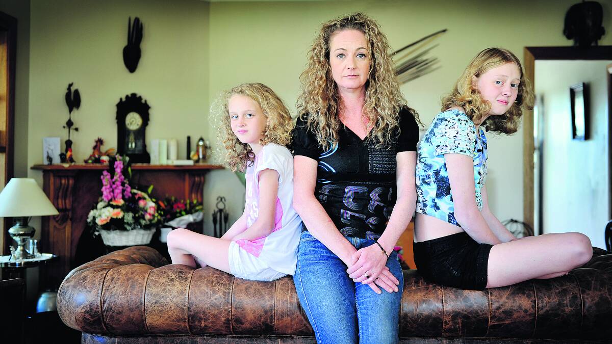 Milly's family Ivy, 10, Jane Richardson and Piper, 13. Pic: Cath Bowen
