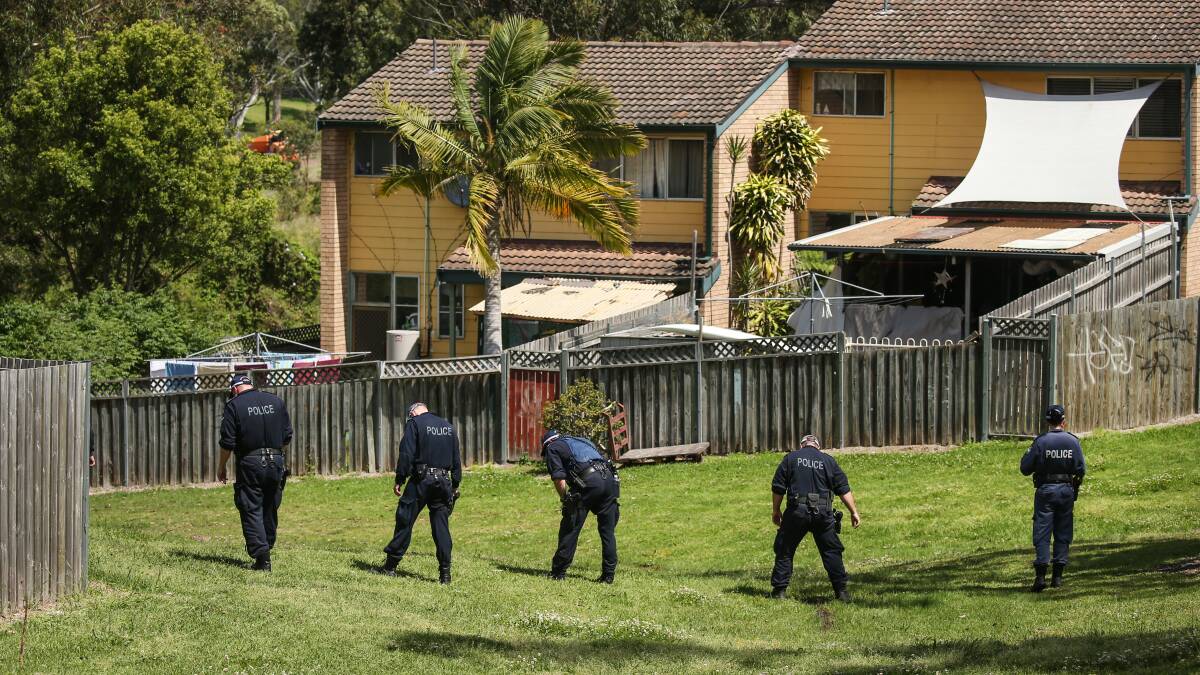 Police search the reserve at Windale on Thursday: Picture: Marina Neil