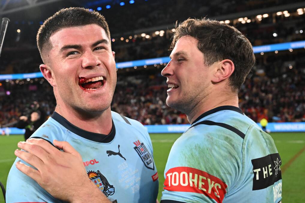 Bradman Best and Mitchell Moses celebrate the Blues' victory. Picture Getty Images