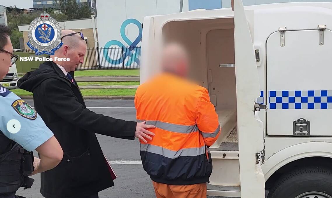 A 36-year-old man is arrested at Mayfield on July 8, accused of being in possession of thousands of files of child abuse material. Picture by NSW Police