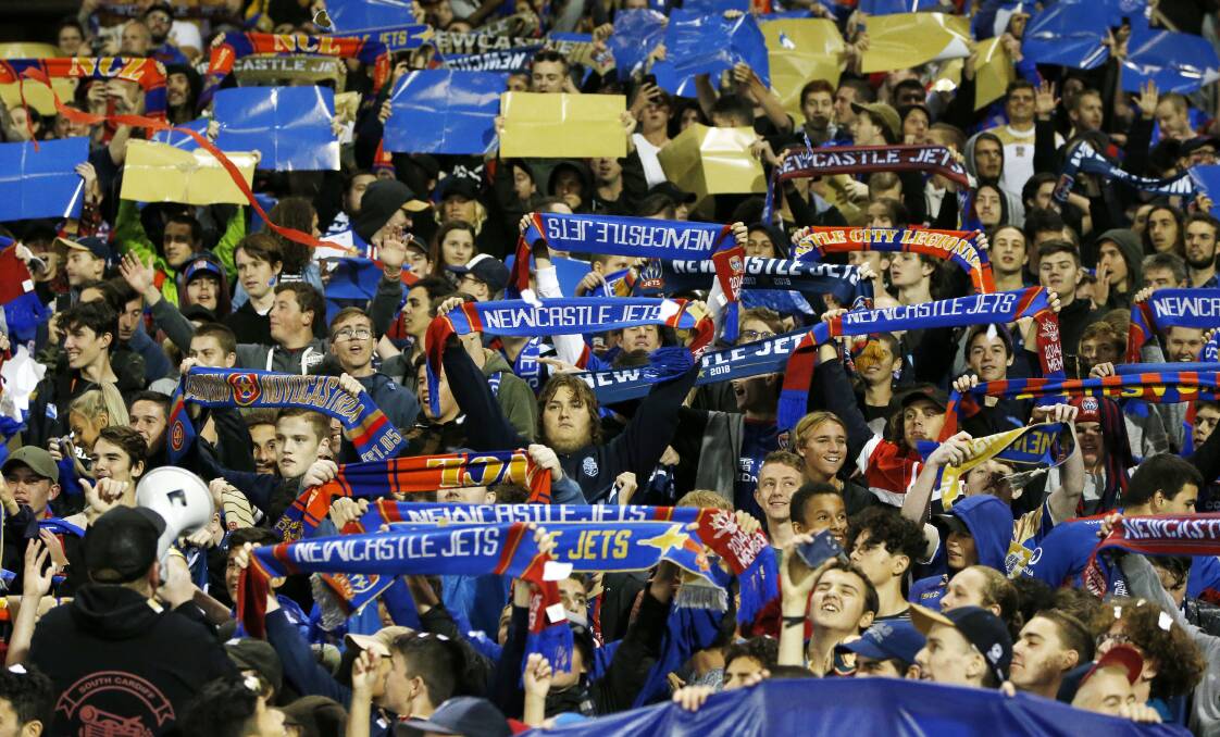 Sea of red and blue: Fans at McDonald Jones Stadium last Friday where Newcastle Jets beat Melbourne City in the grand final qualifier. Picture: AAP
