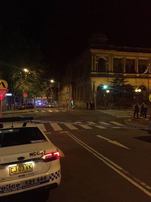 CRIME SCENE: Police tape around the Newcastle post office on October 19 last year after a homeless man was stabbed. Joel Viviensby, 47, pleaded guilty to reckless wounding on Wednesday. Picture: Brodie Owen