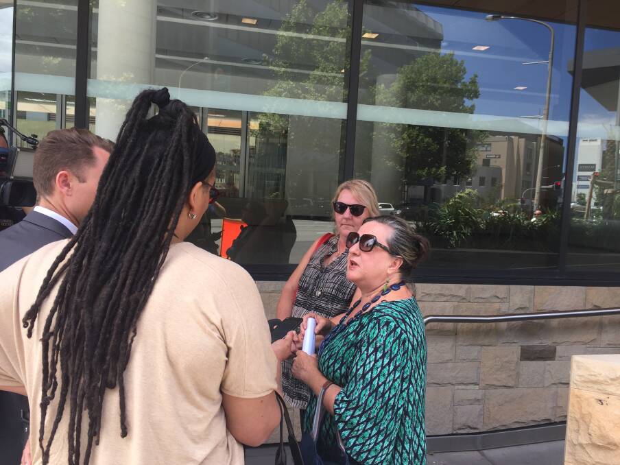 ANSWERS: Dallas Anderson, Stacey McMaugh's older sister, and Julie McMaugh, Stacey's sister-in-law, outside of Newcastle courthouse on Thursday. Picture: Sam Rigney 