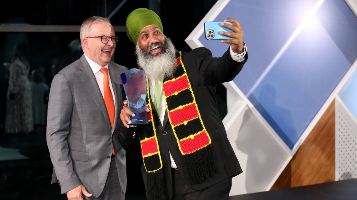 Prime Minister Anthony Albanese presented Amar Singh with the Local Hero of the Year award. Picture by James Croucher