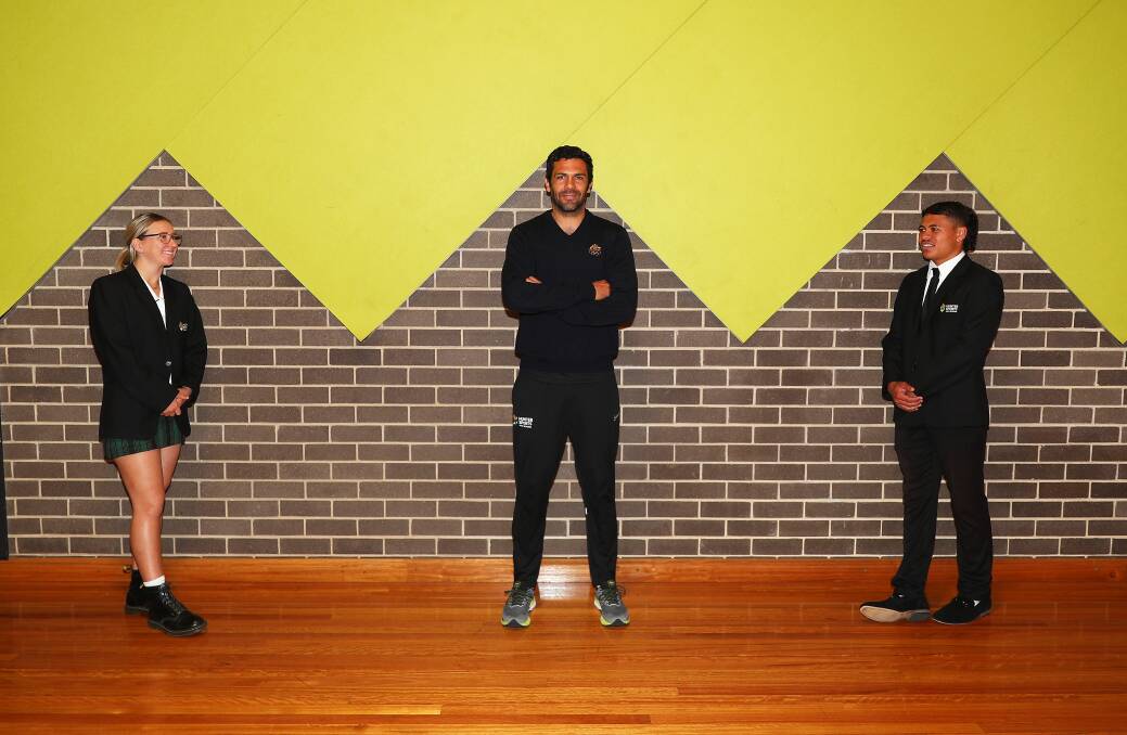 Year 12 Hunter Sports High prefects Charlie Norton and Tai Manaelers with Olympian turned teacher, Nikolai Topor-Stanley at the Olympic pathways announcement. Picture by Peter Lorimer
