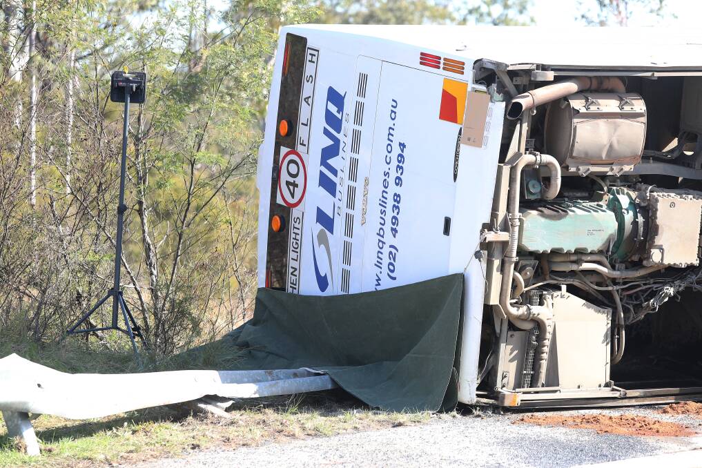 The bus rollover on Wine Country Drive near Greta. Picture by Peter Lorimer