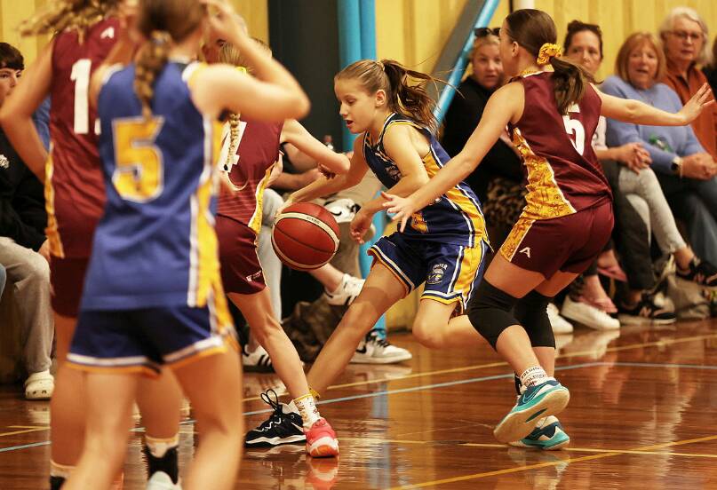 NSW PSSA basketball games: Girls: Hunter versus Polding, Boys - North Coast versus Western. Pictures by Peter Lorimer