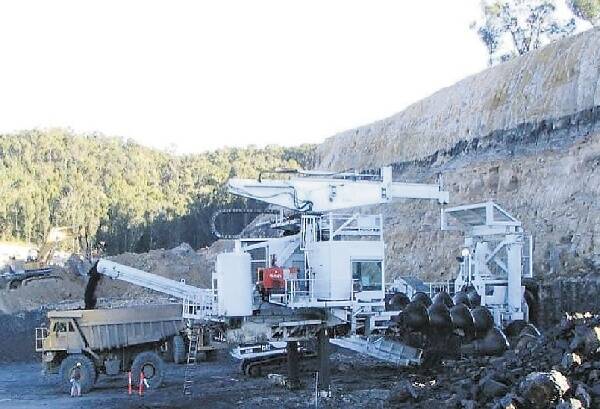 TRUCKLOAD: Centennial Coal's auger operation at its Fassifern mine.  TECHNIQUE: The mining equipment Centennial used in its Fassifern operation.