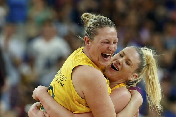 WE DID IT: Suzy Batkovic, left, and Lauren Jackson celebrate the Opals’ victory over Russia in London yesterday.