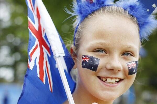 PATRIOTIC: Courtney Whitehead celebrates Australia Day at Speers Point Park. - Picture by Peter Stoop