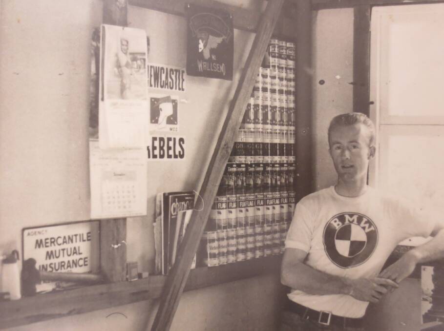 Adam Murphy next to his collection of beer cans in 1961 after he was old enough to start drinking.