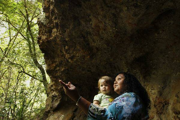 WONDROUS: Melinda Brown with granddaughter Yasmine in the butterfly caves.  Picture: Peter Stoop
